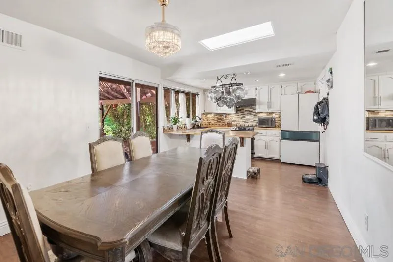 14578 Rios Canyon Road El Cajon, CA 92021 - Photo 8 of 61 a view of a dining room with furniture window and outside view