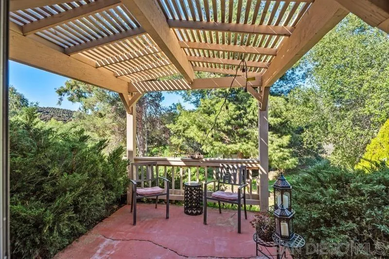 14578 Rios Canyon Road El Cajon, CA 92021 - Photo 10 of 61 a view of a chairs and table in the patio