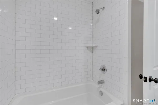 a bathroom with a bathtub