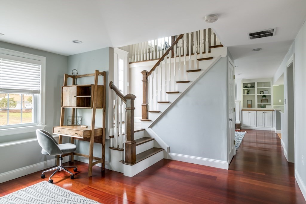 7 Geraldine Lane Braintree, MA 02184 - Photo 15 of 26 a view of entryway and hall with wooden floor