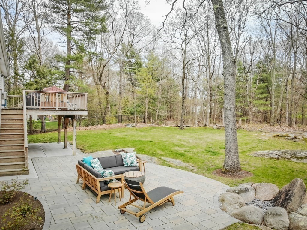 7 Geraldine Lane Braintree, MA 02184 - Photo 23 of 26 a view of a patio with a yard