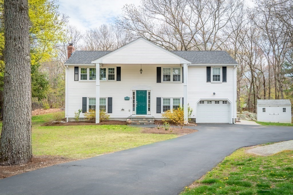 7 Geraldine Lane Braintree, MA 02184 - Photo 26 of 26 a view of a house with pool and chairs next to yard