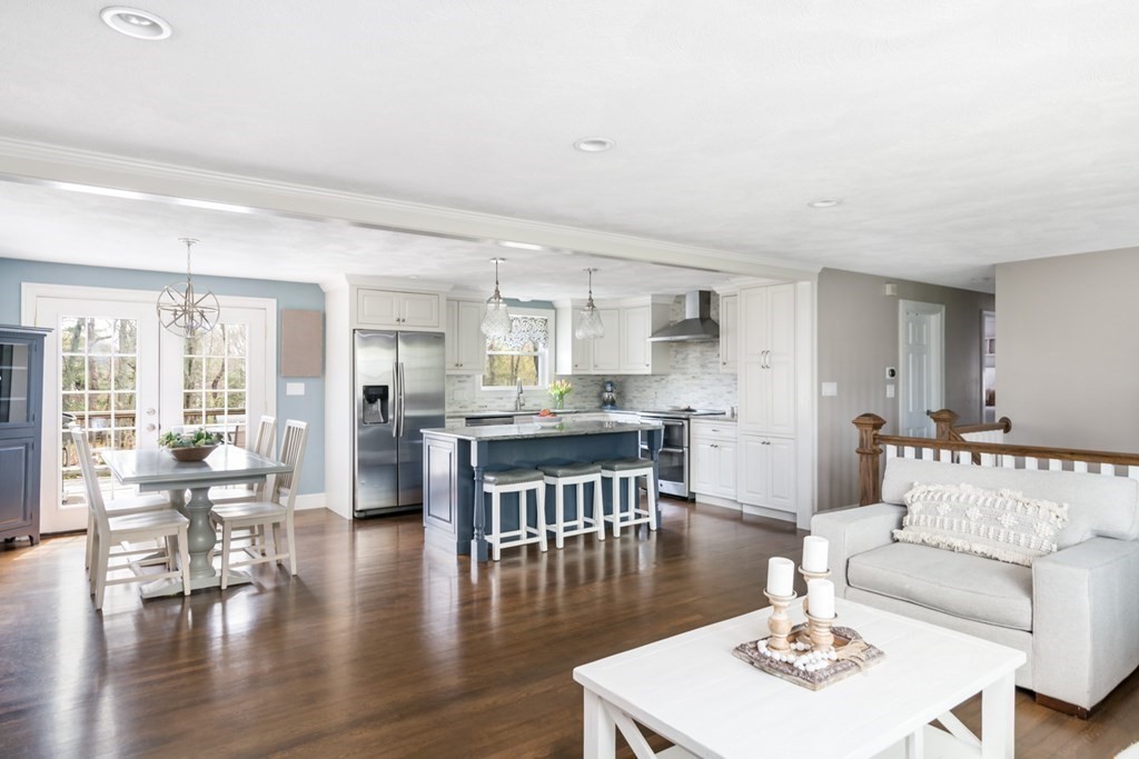 7 Geraldine Lane Braintree, MA 02184 - Photo 5 of 26 a living room with furniture wooden floor and a large window