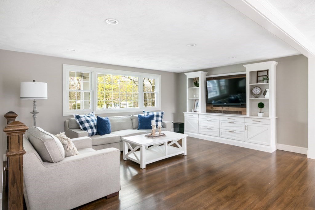 7 Geraldine Lane Braintree, MA 02184 - Photo 6 of 26 a living room with furniture and a flat screen tv