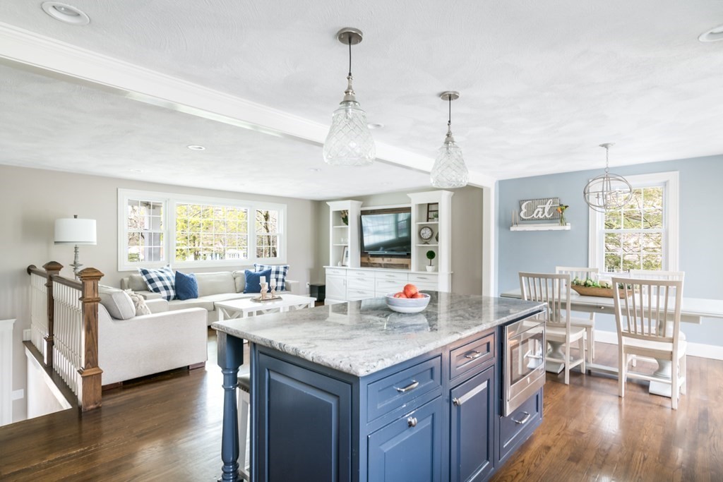 7 Geraldine Lane Braintree, MA 02184 - Photo 7 of 26 a view of living room with granite countertop furniture and fireplace