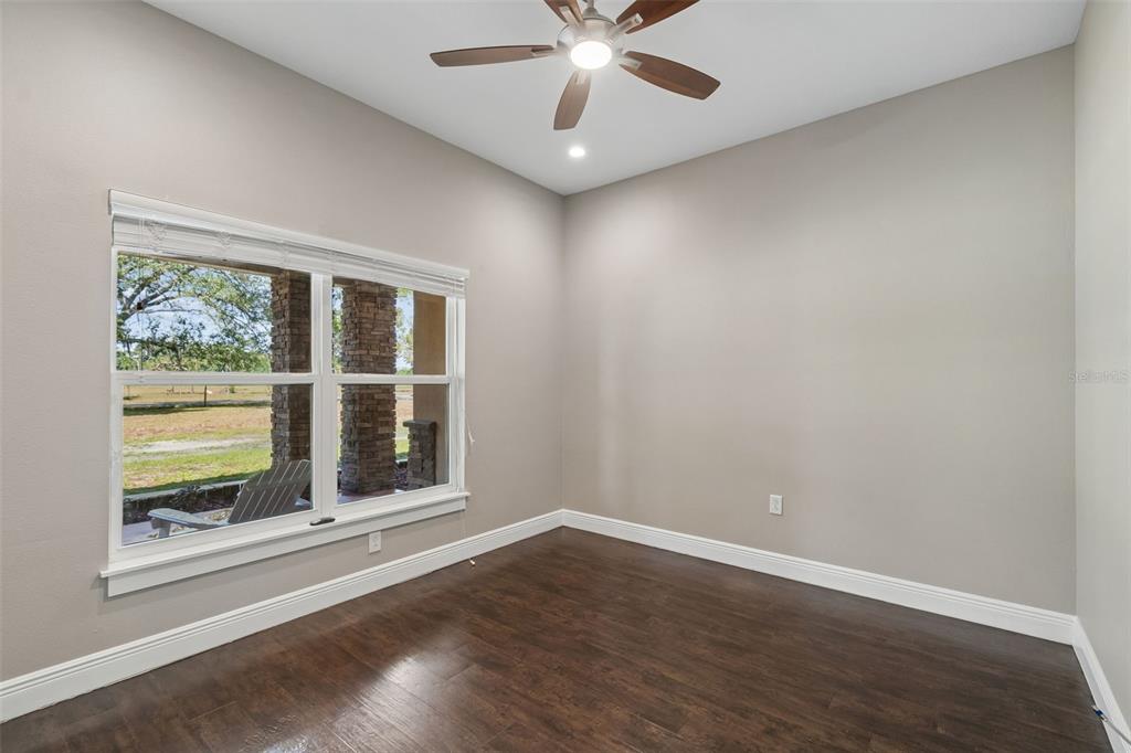 29913 Darby Road Dade City, FL 33525 - Photo 34 of 100 a view of an empty room with a window