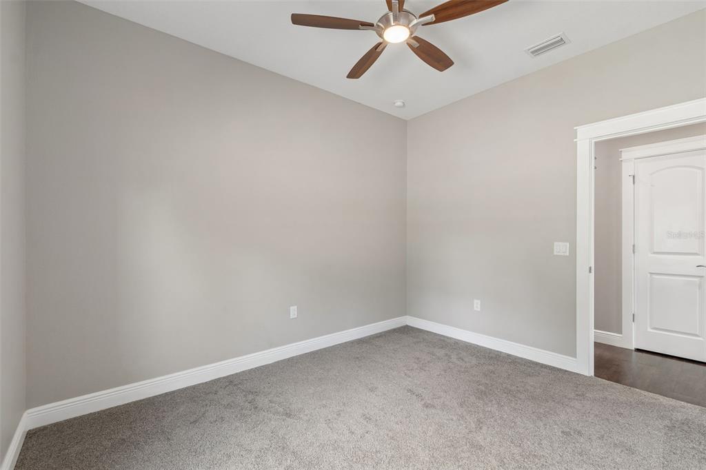 29913 Darby Road Dade City, FL 33525 - Photo 48 of 100 an empty room with a window and a fan