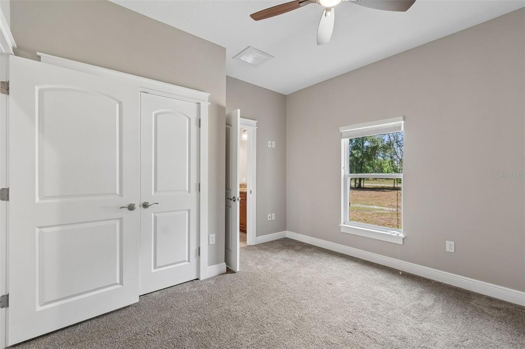29913 Darby Road Dade City, FL 33525 - Photo 51 of 100 a view of an empty room with a window
