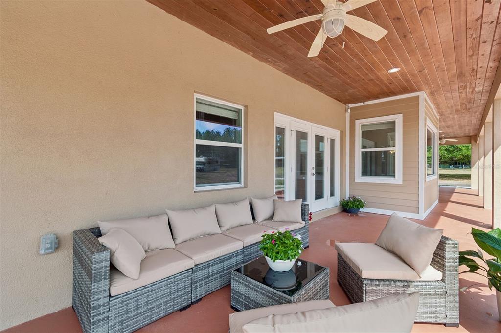 29913 Darby Road Dade City, FL 33525 - Photo 77 of 100 a living room with furniture and windows