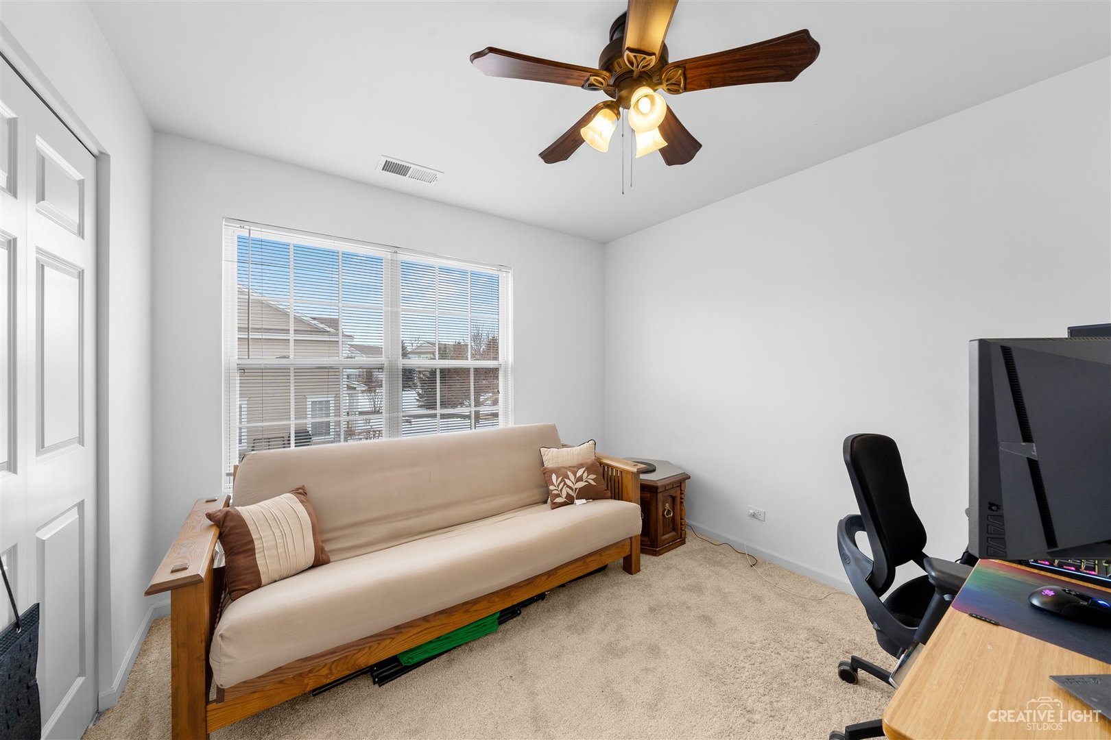 176b Brompton Lane, Unit A Sugar Grove, IL 60554 - Photo 13 of 17 a living room with furniture and a window