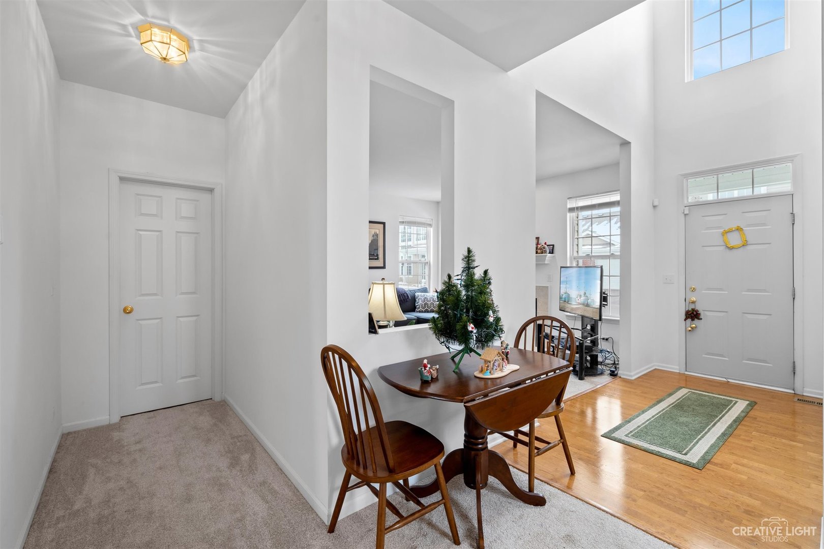 176b Brompton Lane, Unit A Sugar Grove, IL 60554 - Photo 4 of 17 a view of a dining room with furniture and wooden floor