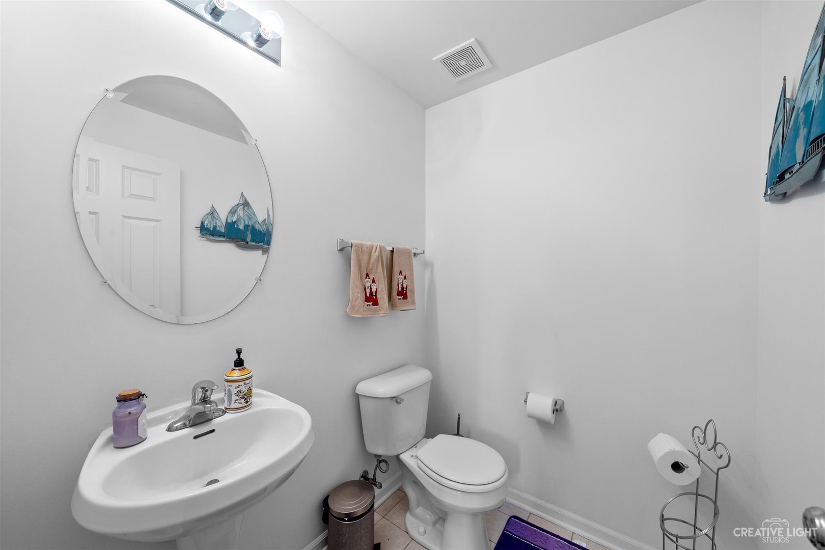 176b Brompton Lane, Unit A Sugar Grove, IL 60554 - Photo 10 of 17 a bathroom with a toilet a sink and a mirror