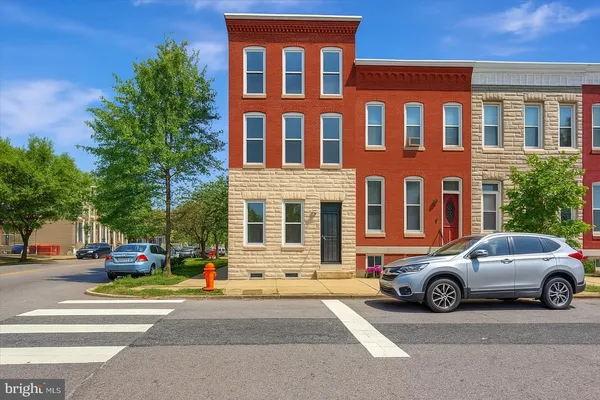 a car parked in front of a building