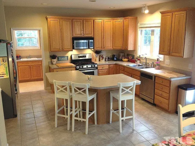 a kitchen with cabinets a sink and counter space