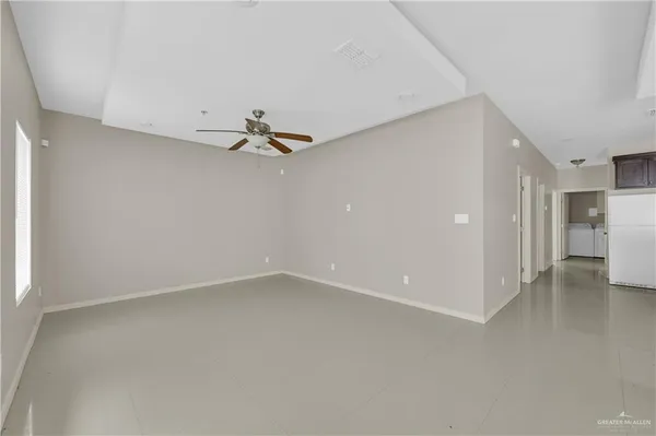 a view of a room with a hallway