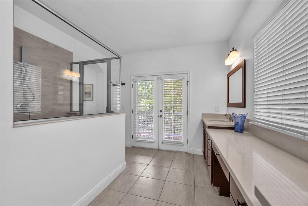 5310 Fishhawk Ridge Drive Lithia, FL 33547 - Photo 27 of 52 a spacious bathroom with a bathtub and a shower