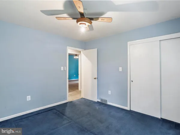 a bathroom with a sink and a washing machine