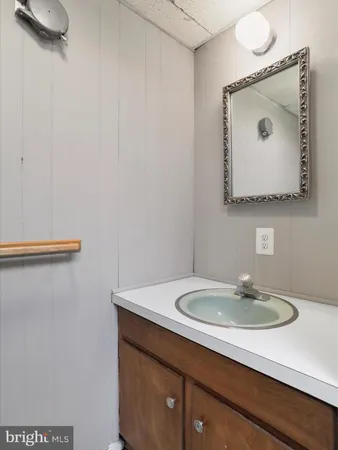 an empty room with a empty space and windows