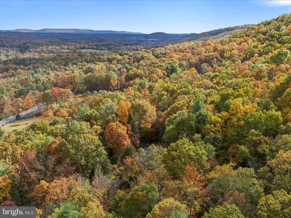 a view of mountains and valleys