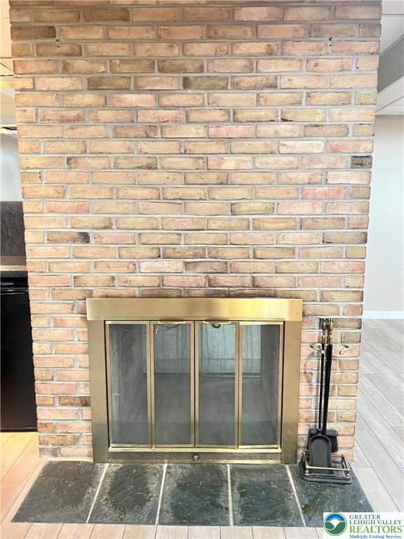 1326 Blue Barn Road Allentown, PA 18104 - Photo 22 of 32 Double-sided fireplace in basement