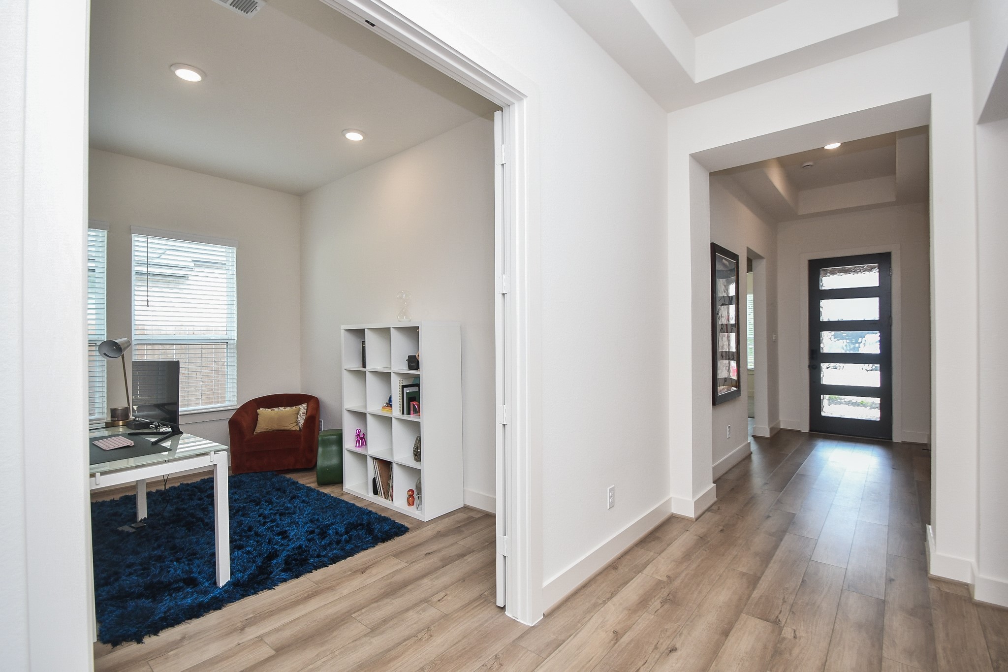 31915 Sky Rdg Lane Fulshear, TX 77441 - Photo 22 of 38 Discover a bright and inviting office/study, thoughtfully designed to enhance focus and productivity in a warm, welcoming atmosphere.