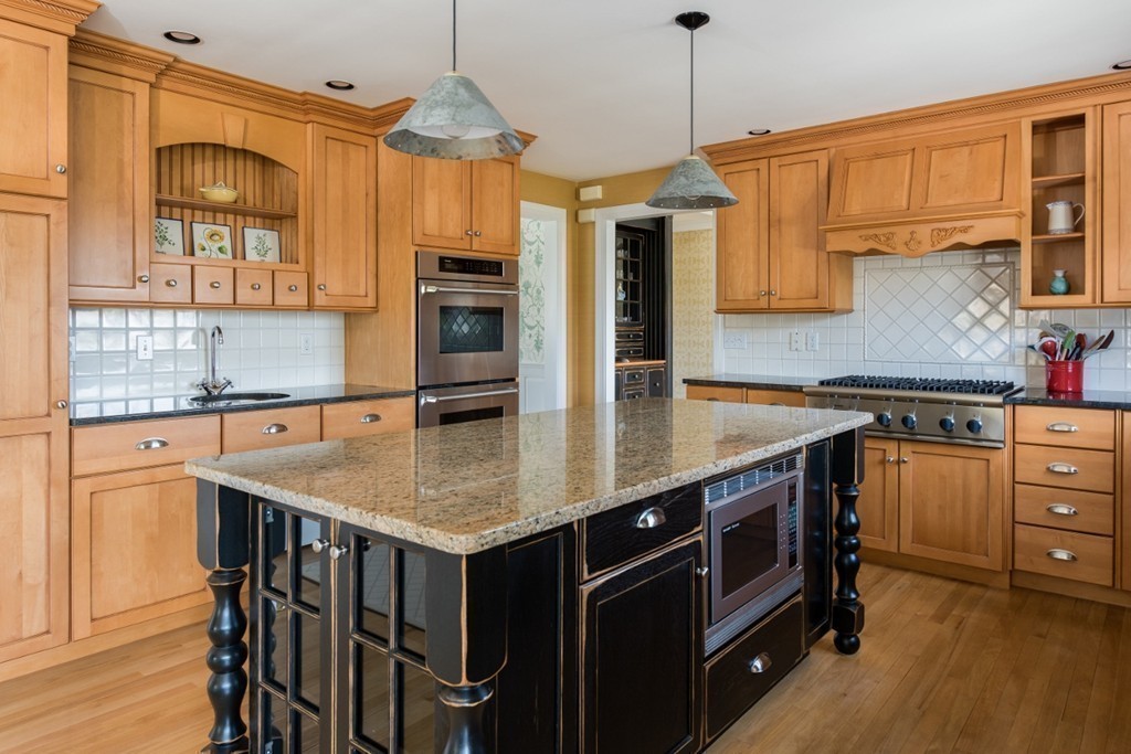 2 Captain Sears Way Chatham, MA 02633 - Photo 11 of 28 a kitchen with stainless steel appliances granite countertop a sink a stove and a wooden floors