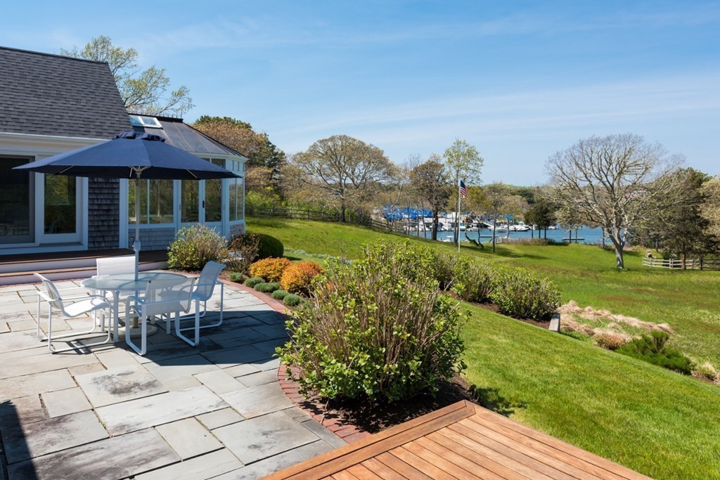 2 Captain Sears Way Chatham, MA 02633 - Photo 19 of 28 a view of a house with garden and a patio