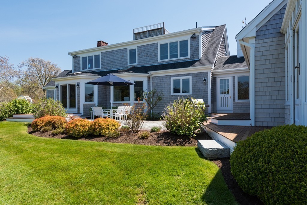 2 Captain Sears Way Chatham, MA 02633 - Photo 20 of 28 a front view of a house with a garden and plants