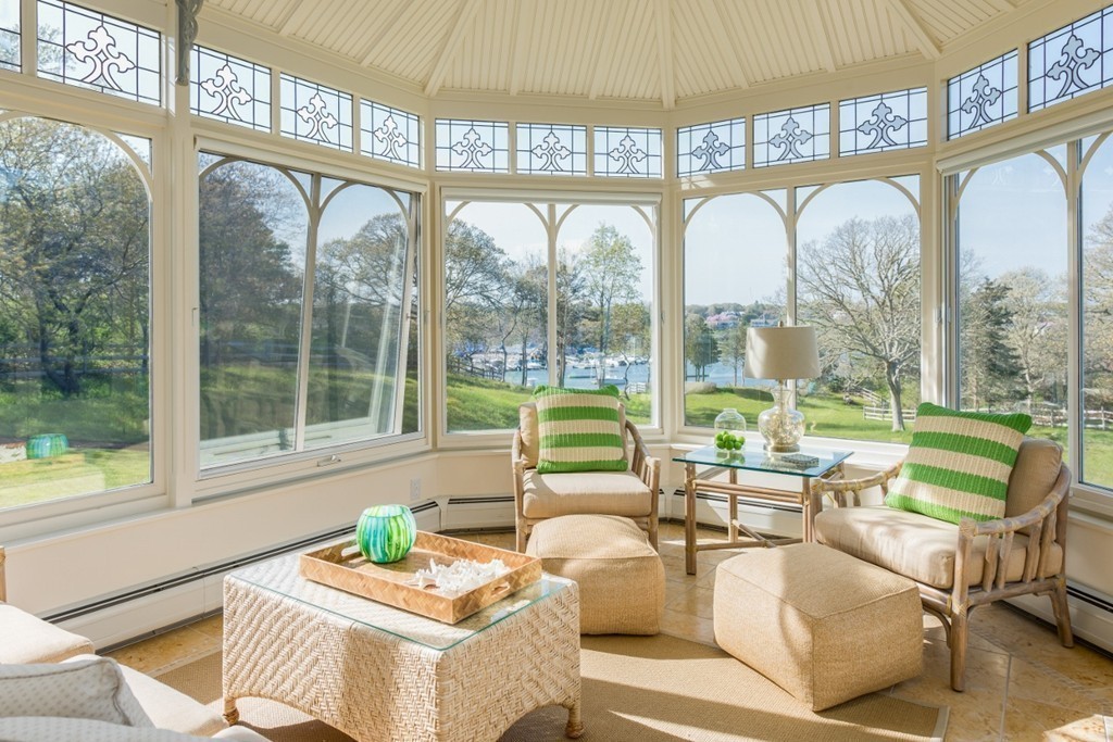 2 Captain Sears Way Chatham, MA 02633 - Photo 5 of 28 a dining room with furniture a chandelier and glass windows