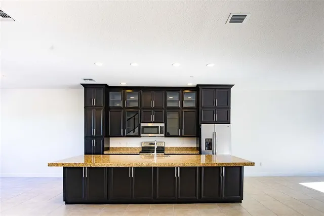 a view of living room with furniture and window