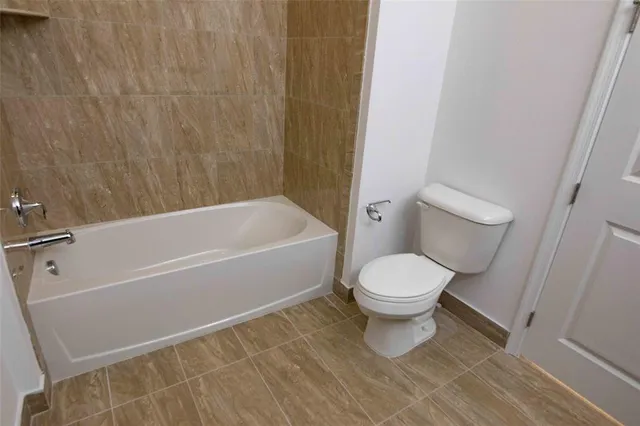 a utility room with two sink and a mirror