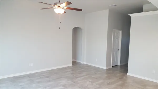 a view of a chandelier fan and a ceiling fan