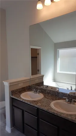 a close view of a bathtub in a bathroom
