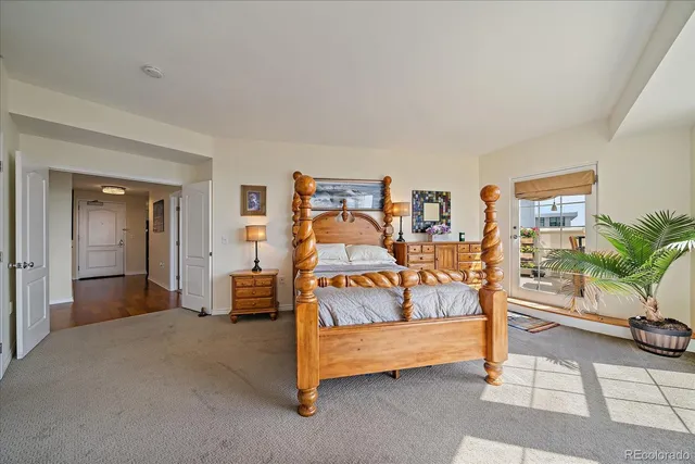 a bedroom with furniture and window