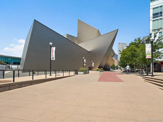 a building with trees in front of it