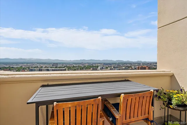 a view of deck and city view