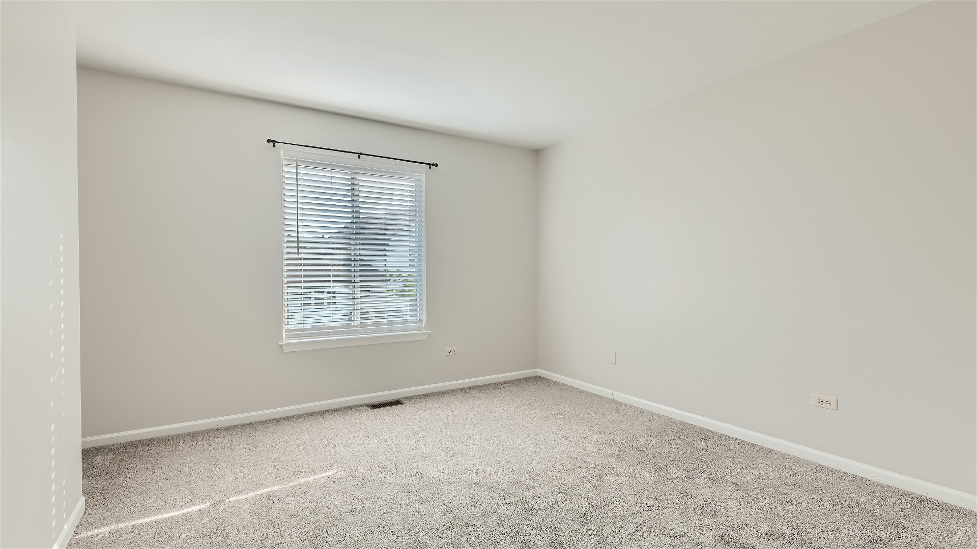 1223 Sumac Trail Hoffman Estates, IL 60192 - Photo 17 of 28 an empty room with a window