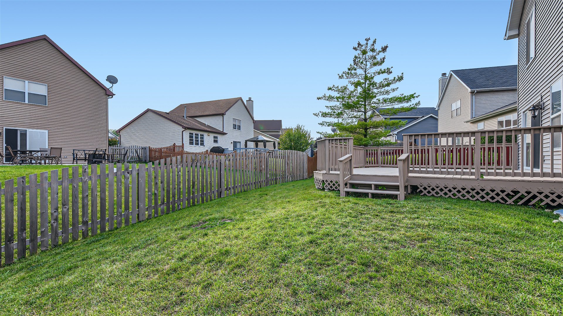 1223 Sumac Trail Hoffman Estates, IL 60192 - Photo 27 of 28 a garden with wooden fence