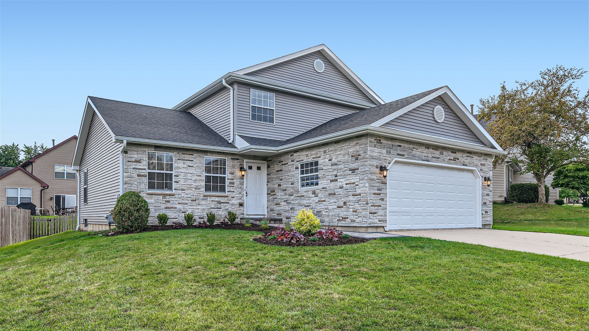 1223 Sumac Trail Hoffman Estates, IL 60192 - Photo 28 of 28 a front view of a house with a garden