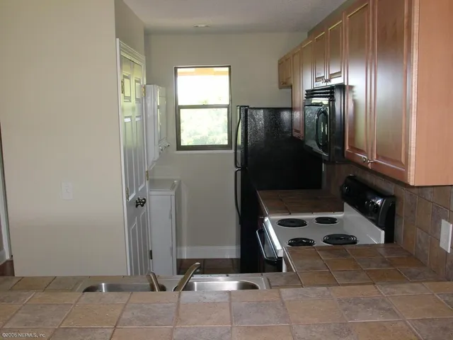 a view of a room that has a window in it