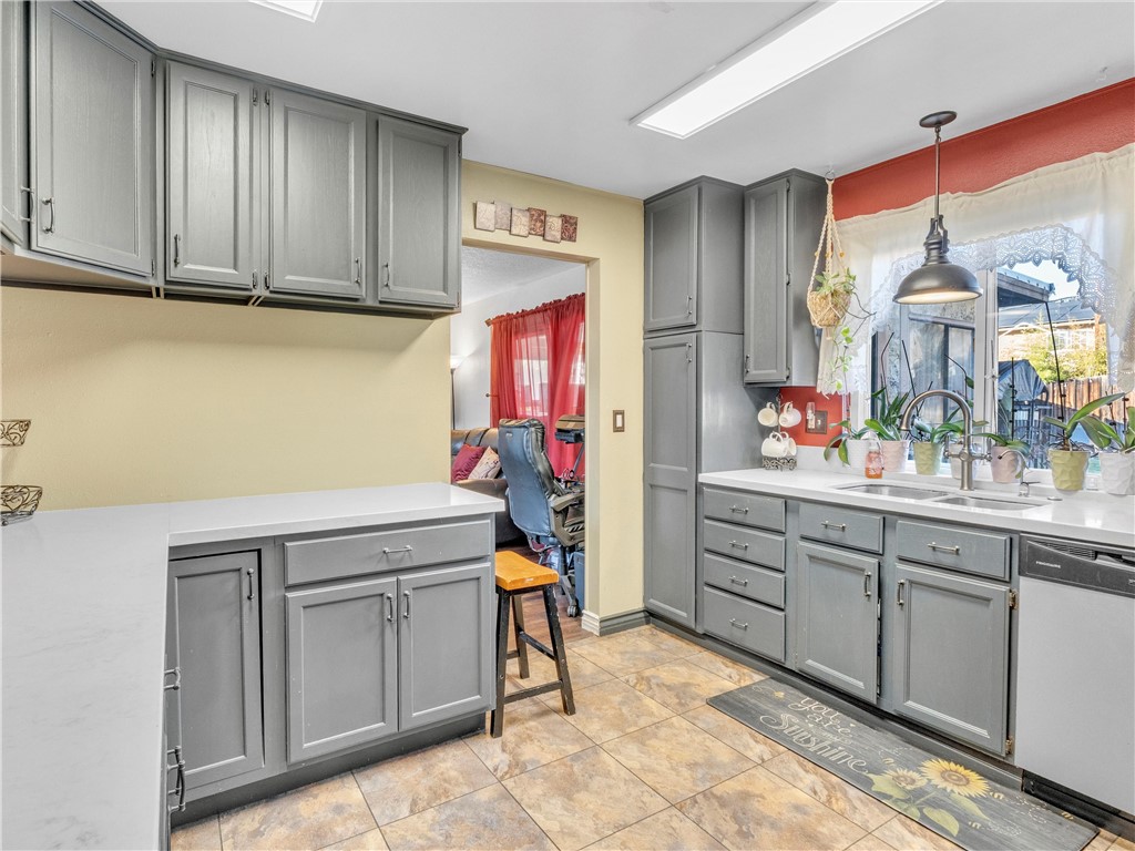 714 Appleton Road Simi Valley, CA 93065 - Photo 11 of 45 a kitchen with cabinets and window