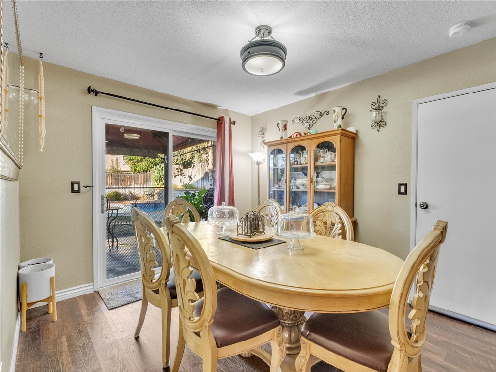 714 Appleton Road Simi Valley, CA 93065 - Photo 14 of 45 a view of a dining room with furniture window and wooden floor