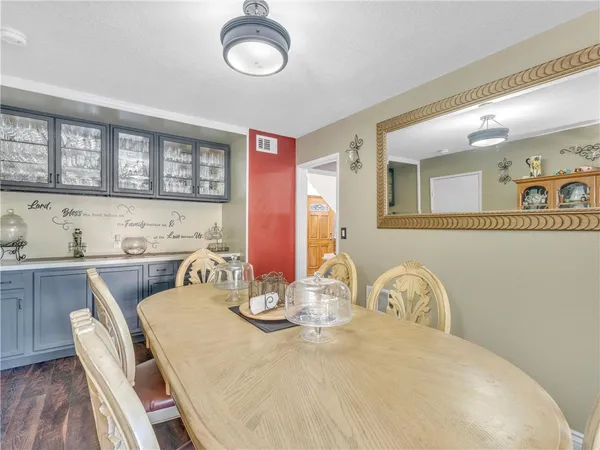 a view of a dining room with furniture
