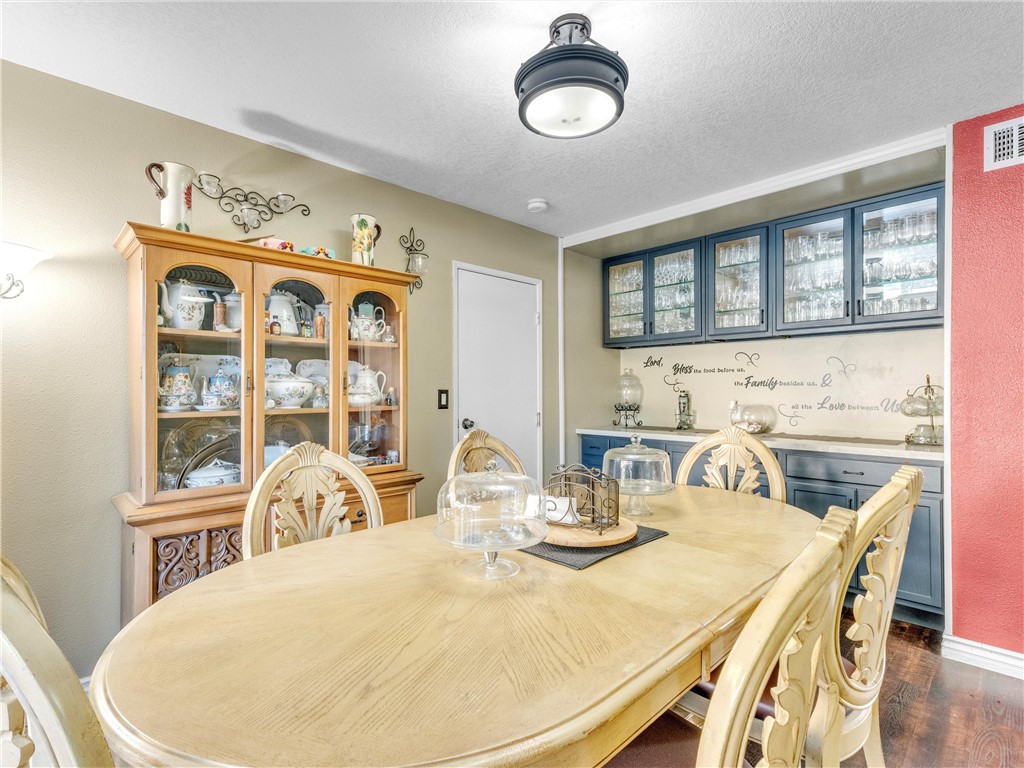 714 Appleton Road Simi Valley, CA 93065 - Photo 17 of 45 a view of a dining room with furniture and chandelier