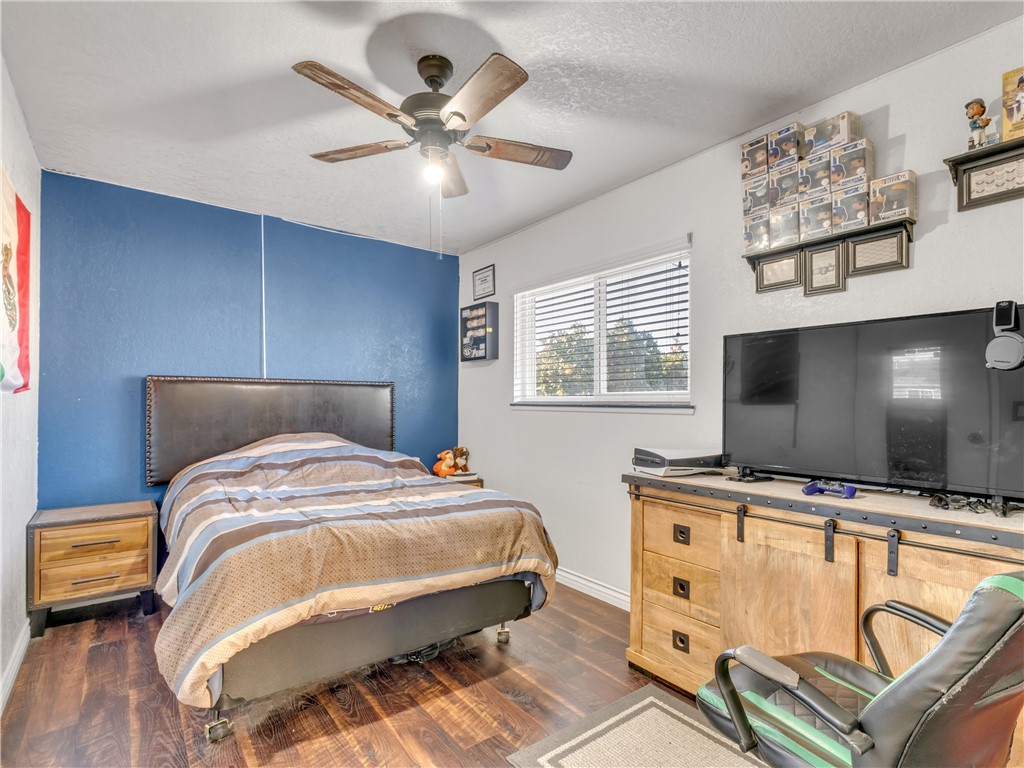 714 Appleton Road Simi Valley, CA 93065 - Photo 28 of 45 a bedroom with a bed and a flat screen tv