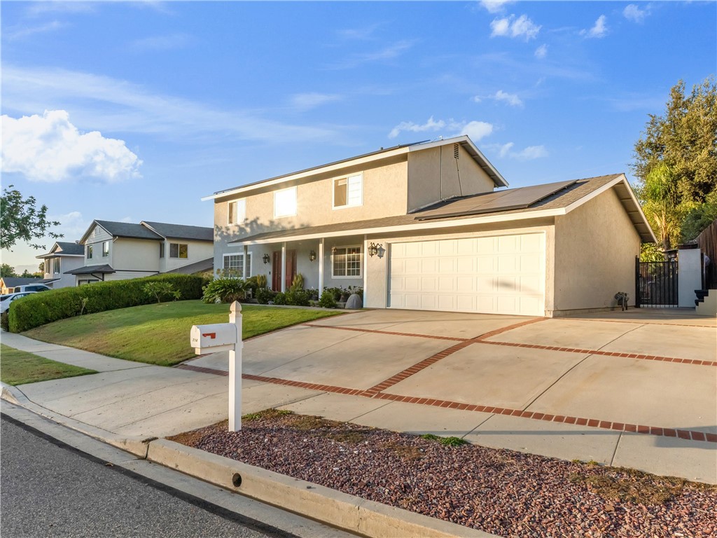 714 Appleton Road Simi Valley, CA 93065 - Photo 3 of 45 a front view of a house with garden