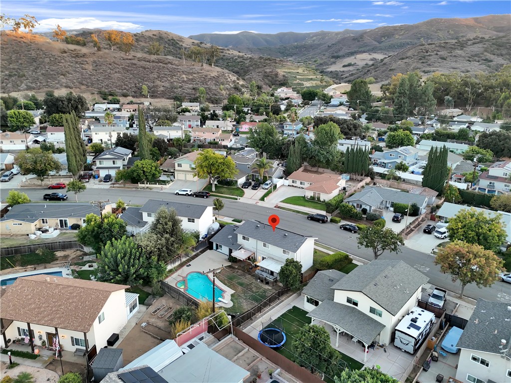 714 Appleton Road Simi Valley, CA 93065 - Photo 44 of 45 an aerial view of a city with lots of residential buildings and mountain view in back