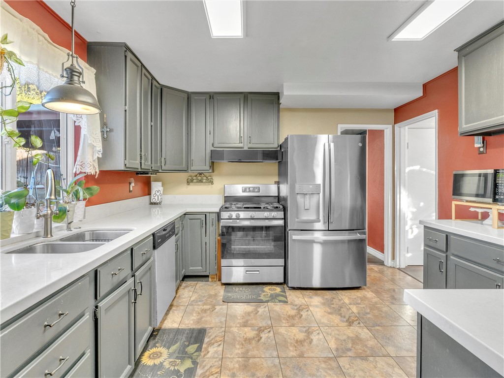 714 Appleton Road Simi Valley, CA 93065 - Photo 10 of 45 a kitchen with stainless steel appliances a refrigerator sink and stove