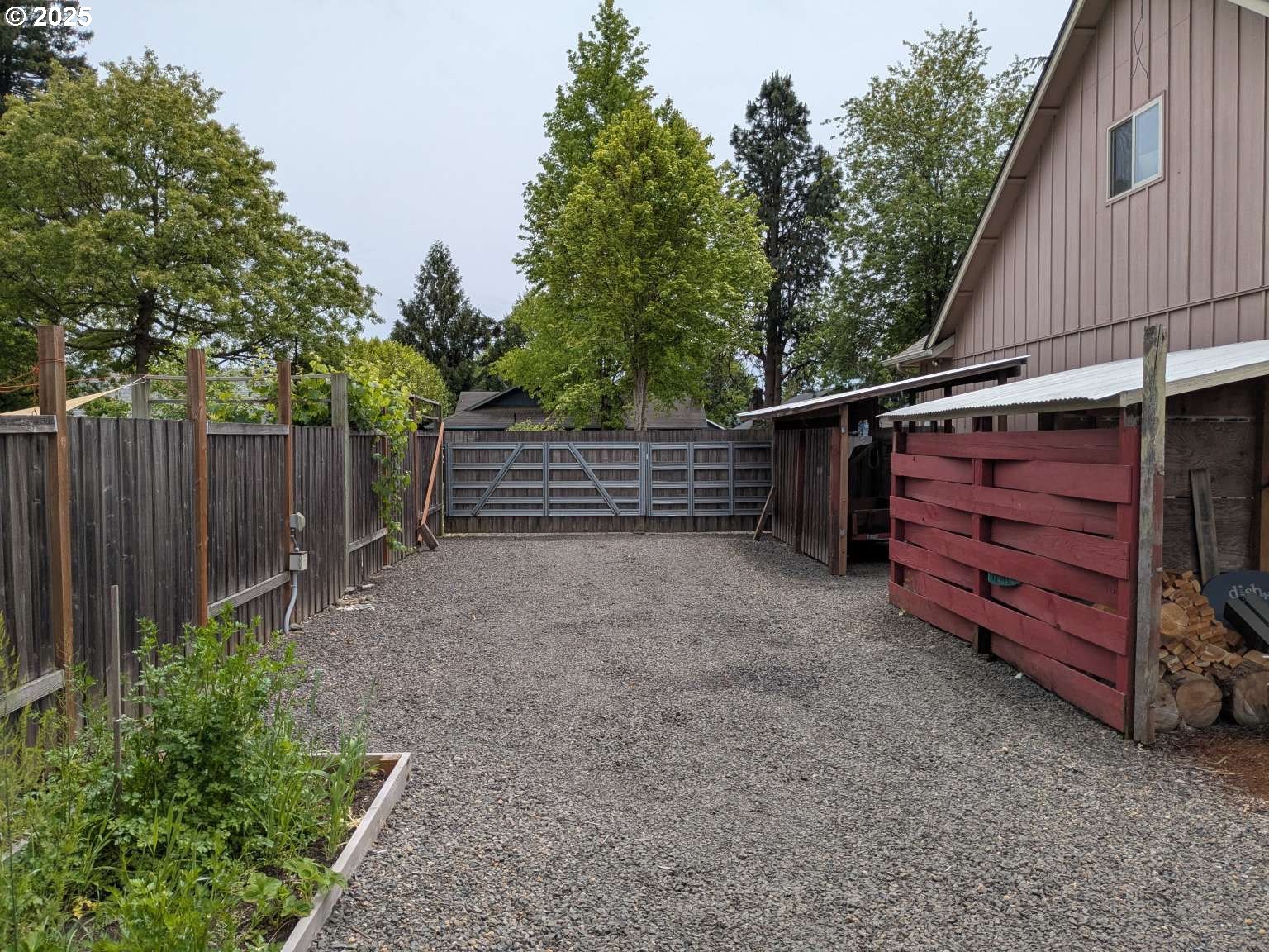 4235 Jessen Drive Eugene, OR 97402 - Photo 18 of 31 a view of a house with a backyard