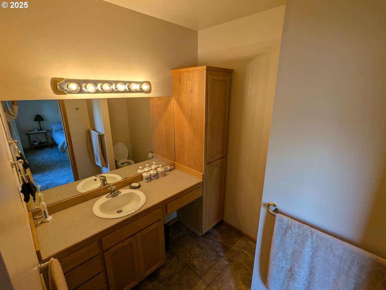 4235 Jessen Drive Eugene, OR 97402 - Photo 9 of 31 a bathroom with a sink and a mirror